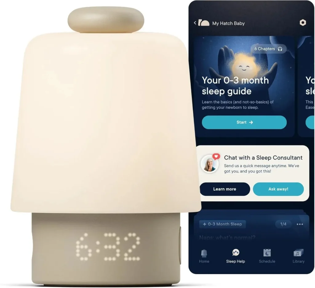 Smart baby sleep trainer night light with digital clock display showing 6:32, positioned next to a smartphone displaying the companion app with 0-3 month sleep guides and consultant chat features.